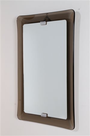 FONTANA LUIGI Specchio in vetro curvato,1952. vetro. Cm 59,00 x 90,00 x 6,00....