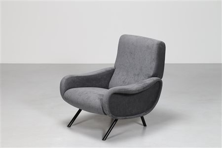 ZANUSO MARCO (1916 - 2001) Poltrona con gambe tubolari in ottone, imbottitura...