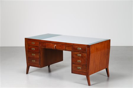 PONTI GIO' (1891 - 1979) Scrivania in legno di noce e piano in formica per la...