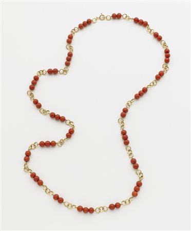 Collana ad anelli attorcigliati lisci in oro giallo distanziata da boules di...