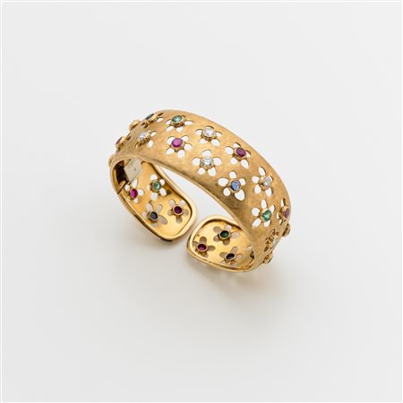 Bracciale rigido alla schiava in oro giallo satinato con due aperture a...