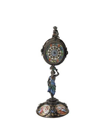ANONIMO Piccolo orologio a ostensorio in argento e smalti policromi Epoca...