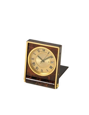 JAEGER LE COULTRE Orologio da viaggio in ottone dorato e lacca a finto legno...