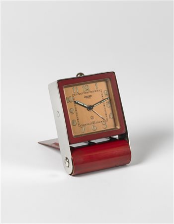 JAEGER Orologio da viaggio in metallo cromato e laccato bordeaux Anni '40...