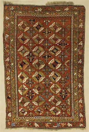 OUSHAN KURK Persia Orientale. 1920 circa. Fondo senape, disegno in stile...