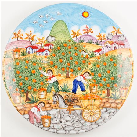 G. SOLDANO PIATTO in ceramica dipinta raffigurante "raccolta di arance"....