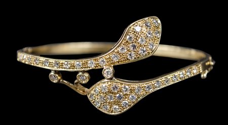 BRACCIALE alla schiava in oro giallo 18 Kt. con brillanti 8/8 (Ct. 1.40) (g....