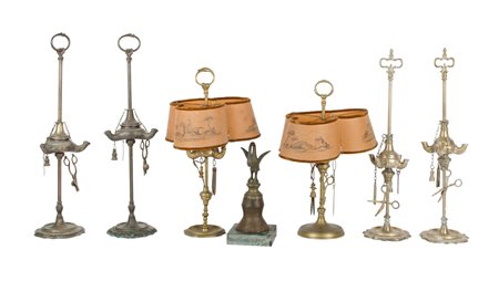 LOTTO composto da sei LUCERNE in metallo e da SCULTURA in metallo...