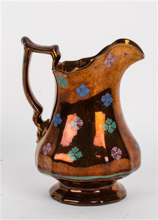 CANNATA maltese in ceramica smaltata e decorata. XX secolo Misure: h cm 19,5