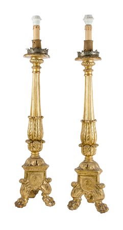 COPPIA TORCIERI in legno intagliato e dorato ad oro zecchino. Italia XVIII...