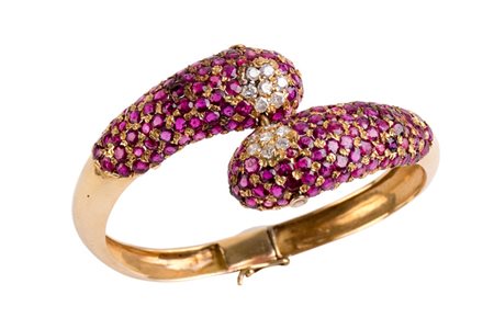 Bracciale con rubini e brillanti. Oro 18 Kti. . Rubini cti. 9 c.ca Brillanti...