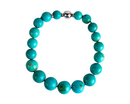 Filo di turchesi Firmato Petochi. a gradazione mm 17 - 25 Chiusura oro bianco...