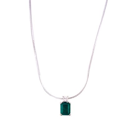 ciondolo con smeraldo e diamante . Smeraldo cti. 2,30 c.ca diamante pricess...