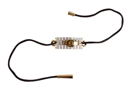 Bracciale firmato Louis Vuitton con astuccio. Oro e oro bianco 18...