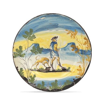 Piatto in maiolica Montelupo, XVIII Sec. d. 22,5 cm. decorato a gran fuoco in...