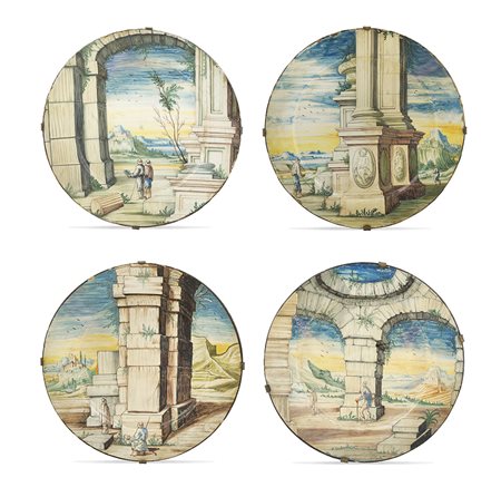 Quattro piatti in maiolica Pavia, Fabbrica Rampini 1700 circa d. 25 cm....