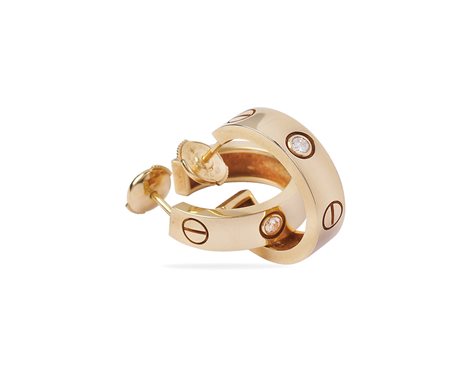 Cartier "Love", orecchini in oro giallo 18kt firmato e numerato H56390 peso...