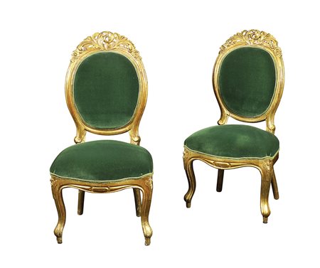 Coppia di sedie in legno dorato Francia, XIX Sec. h. 102 cm. intagliato a...