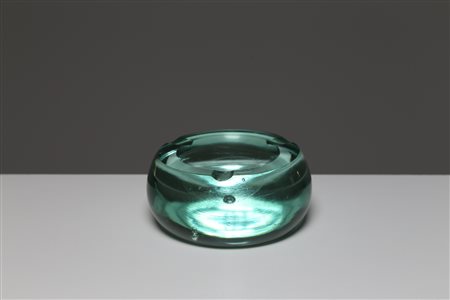 MANIFATTURA MURANESE Posacenere in vetro verde, Murano anni 60°. -. Cm 12,00...