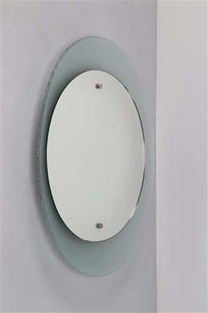 CRISTAL ART TORINO Specchio ovale concavo, anni 50. -. Cm 55,00 x 62,50 x 8,50.