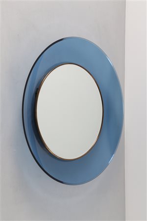 INGRAND MAX (1908 - 1969) Specchio in cristallo colorato blu curvato molato e...