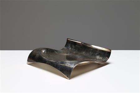 GIUGIARO GIORGETTO (n. 1938) Centrotavola in metallo argentato, mod. Duino...
