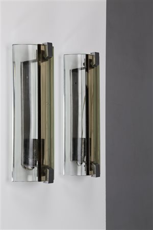 VECA Coppia di appliques in acciaio cromato e cristallo, anni 60. -. Cm 11,00...