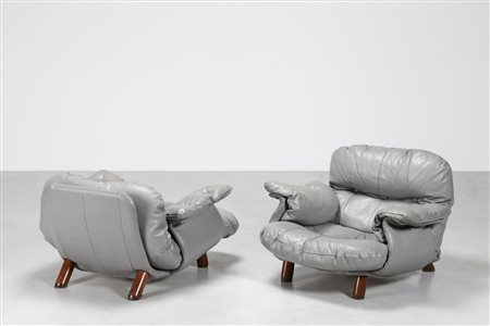 LAFER PERCIVAL Attrib. coppia di poltrone in legno e pelle, anni 60 . -. Cm...