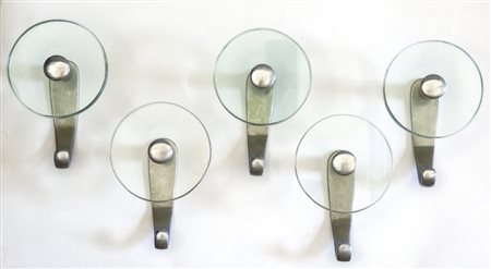 FONTANA ARTE Un insieme di 5 appendiabiti, primi anni "40. Cristallo molato,...