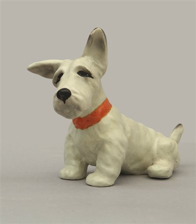 IVOS PACETTIUn cane in ceramica, anni "30. Marcato "La Fiamma Ivos". Cm 15...