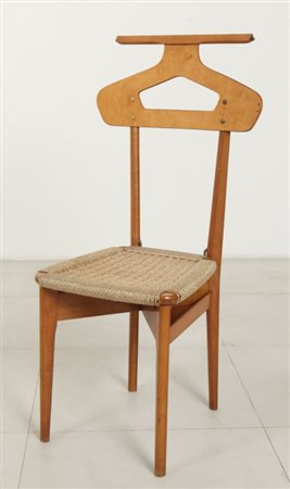 FRATELLI REGUITTI Una sedia-indossatore, anni "50. Legno di faggio,...