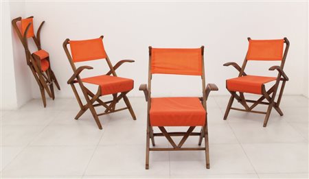 QUATTRO POLTRONCINE PIEGHEVOLI, anni "50. Legno di faggio, ottone, tela....