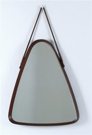 UNO SPECCHIO DA PARETE, anni "60. Legno di teak, cristallo argentato. Cm 66 x...