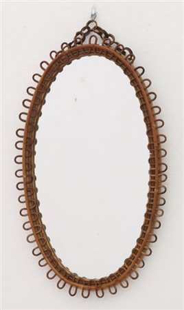UNO SPECCHIO DA PARETE, anni "60. Bambù, giunco, cristallo argentato. Cm 78 x...