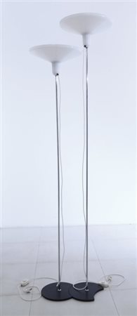 HARVEY & GUZZINI (Editore)Due lampade da terra componibili, anni "70. Ghisa...