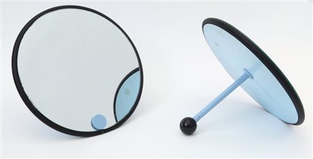 DUE SPECCHI DA TAVOLO, anni "80. Legno laccato, gomma, ferro verniciato,...