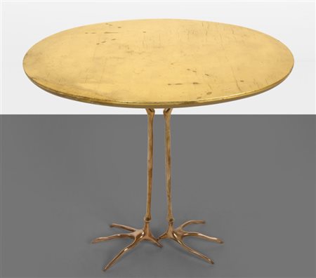 MERET OPPENHEIM Un tavolino "Traccia" per SIMON GAVINA, 1972. Bronzo, legno...