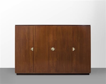 PAOLO BUFFA Un armadio, anni '30. Legno impiallacciato in noce, ottone. Cm...