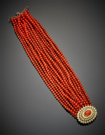 Bracciale a diciassette fili di boules di corallo arancione con chiusura in...