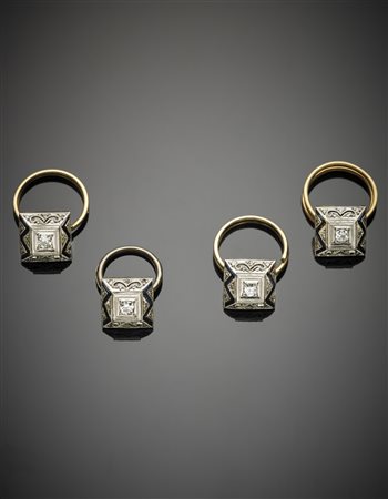 Quattro bottoni in oro giallo e platino, quadrati a piramide tronca, con...