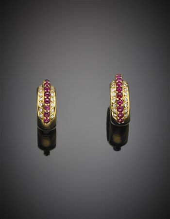 Orecchini in oro giallo con diamanti rotondi e rubini cabochon g. 16,90....