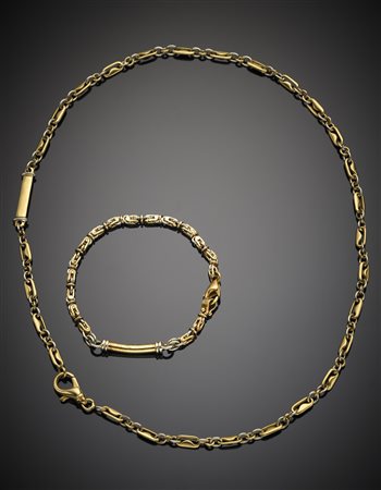 Catena e bracciale in oro bianco e giallo, entrambi con barretta, complessivi...
