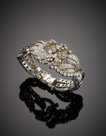 Bracciale semirigido a fiori e foglie in oro bianco con diamanti e zaffiri,...