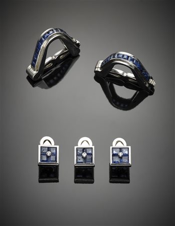 Gemelli e tre bottoni in oro bianco e zaffiri g. 21,30 (uno zaffiro mancante)...