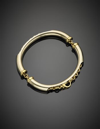 POMELLATO Bracciale in oro bianco e giallo semi-rigido con catena a scomparsa...