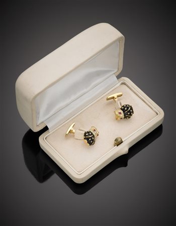 ANTORA' Gemelli in oro giallo e smalti a forma di civetta con occhi di rubini...