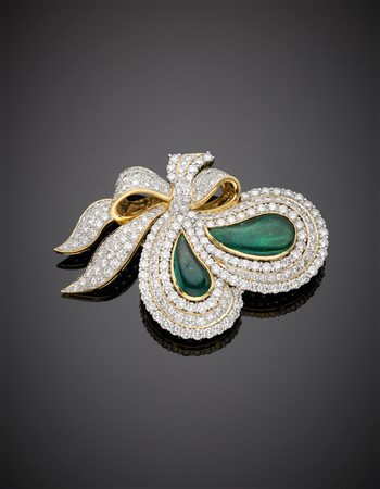 Broche in oro giallo, come un nastro, con pavè di diamanti rotondi e due...