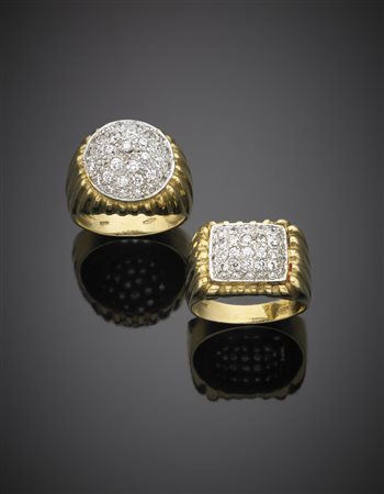 Lotto composto da due anelli in oro giallo e bianco a fascia costolata e con...