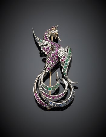 Spilla a guisa di uccello del parardiso in oro giallo e bianco con diamanti...