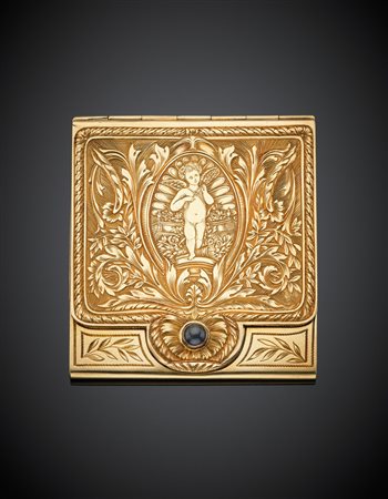 Portacerini in oro giallo con volute floreali e zaffiro cabochon, g. 35,50,...